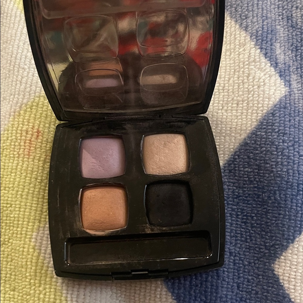 CHANEL Eyeshadow Palette with Purple, Cream, Tan, and Black